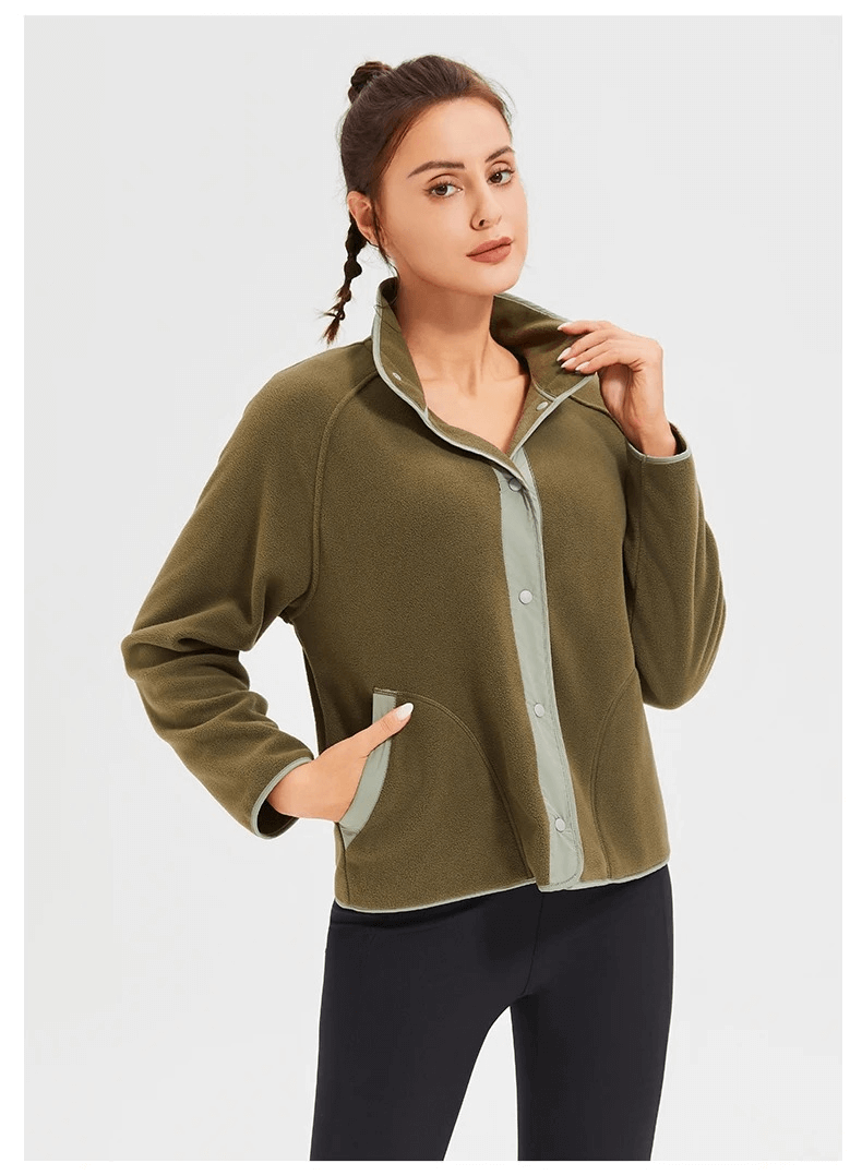 Woman wearing stylish wool sports jacket for running, windproof and perfect for winter. Ideal for maintaining running routine.